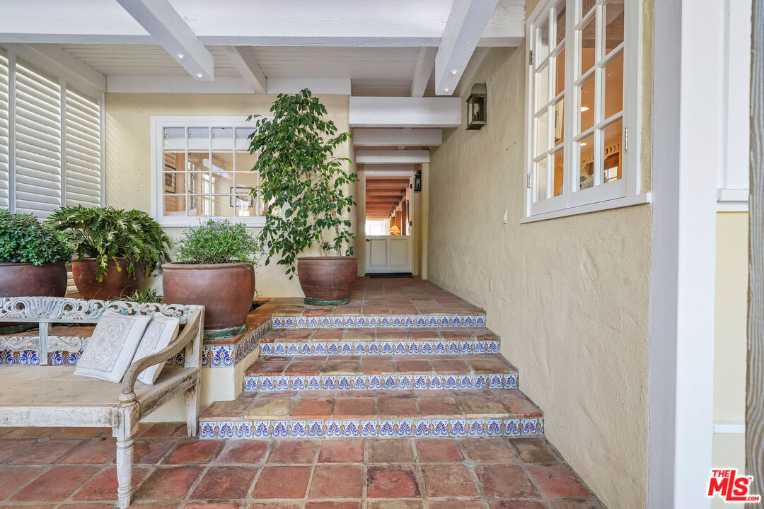 23422 Malibu Colony Road, Unit 98 Malibu, CA 90265 - Photo 40 of 53 a view of an entryway with a rug