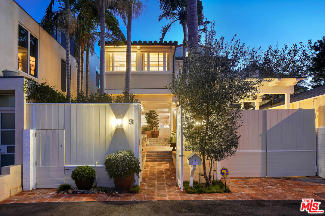 23422 Malibu Colony Road, Unit 98 Malibu, CA 90265 - Photo 48 of 53 a front view of a house with garden