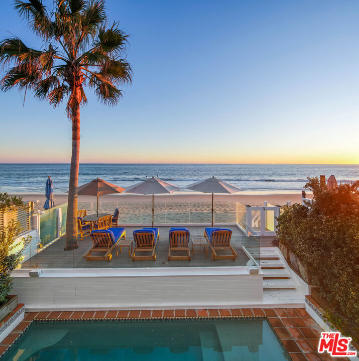 23422 Malibu Colony Road, Unit 98 Malibu, CA 90265 - Photo 49 of 53 a view of a terrace with a terrace