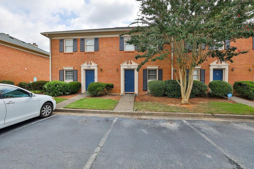 2872 Webb Bridge Road Alpharetta, GA 30009 - Photo 1 of 1 a house view with a outdoor space