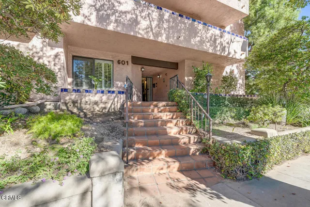 a front view of a house with a porch