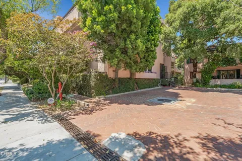 a view of a road with a trees