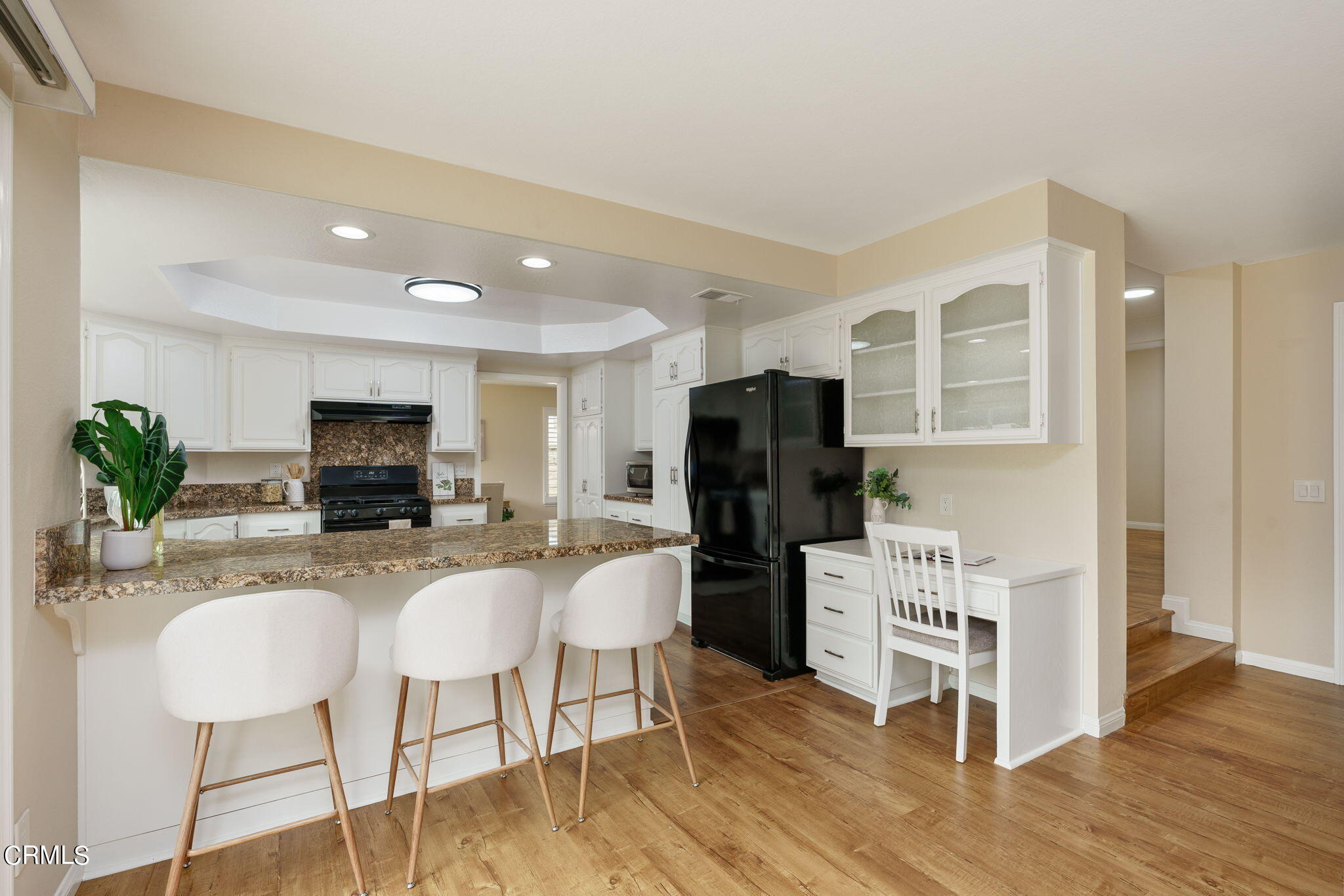 2281 Southern Hill Drive Oxnard, CA 93036 - Photo 11 of 29 a kitchen with stainless steel appliances a refrigerator and a stove top oven