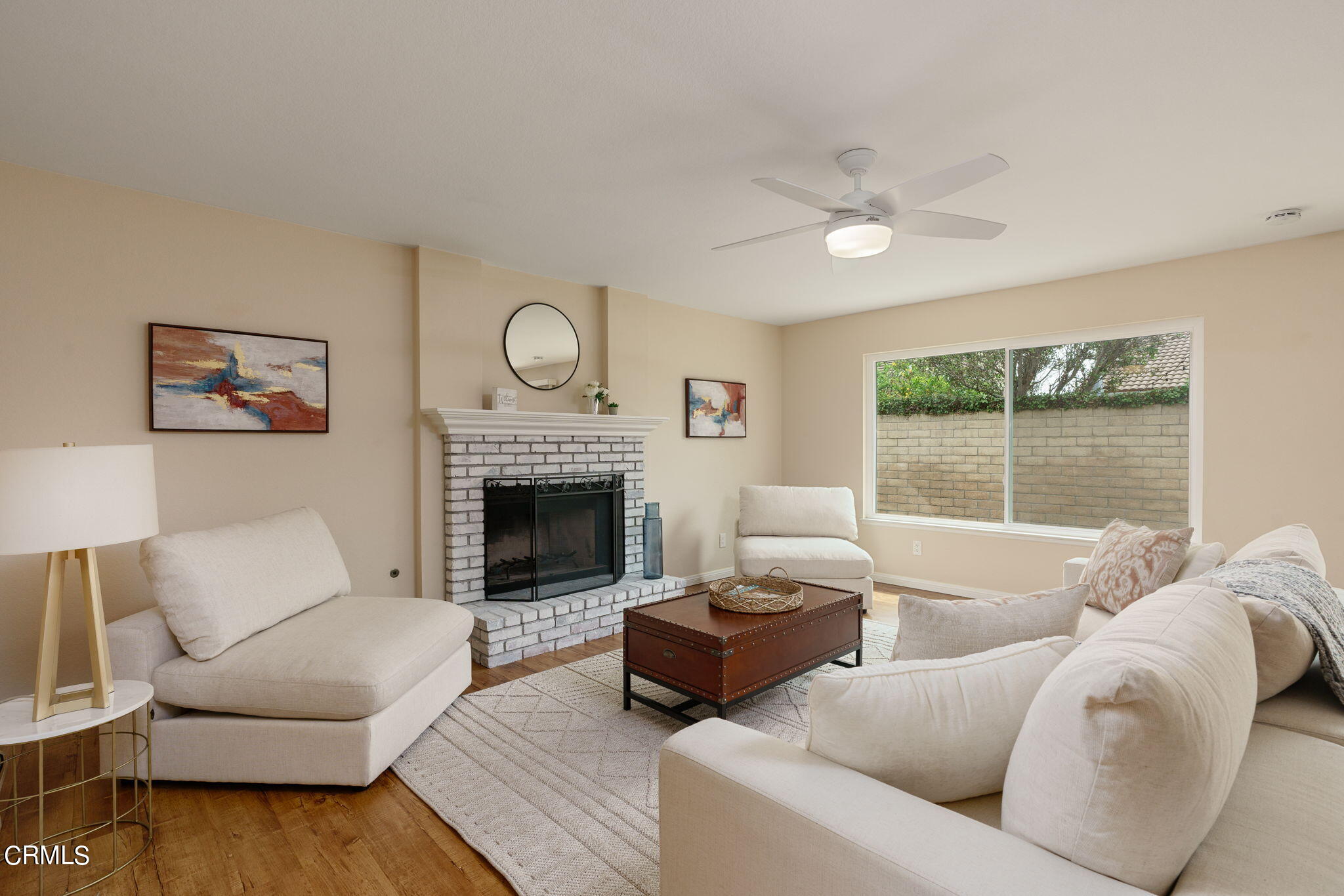2281 Southern Hill Drive Oxnard, CA 93036 - Photo 12 of 29 a living room with furniture a large window and a fireplace