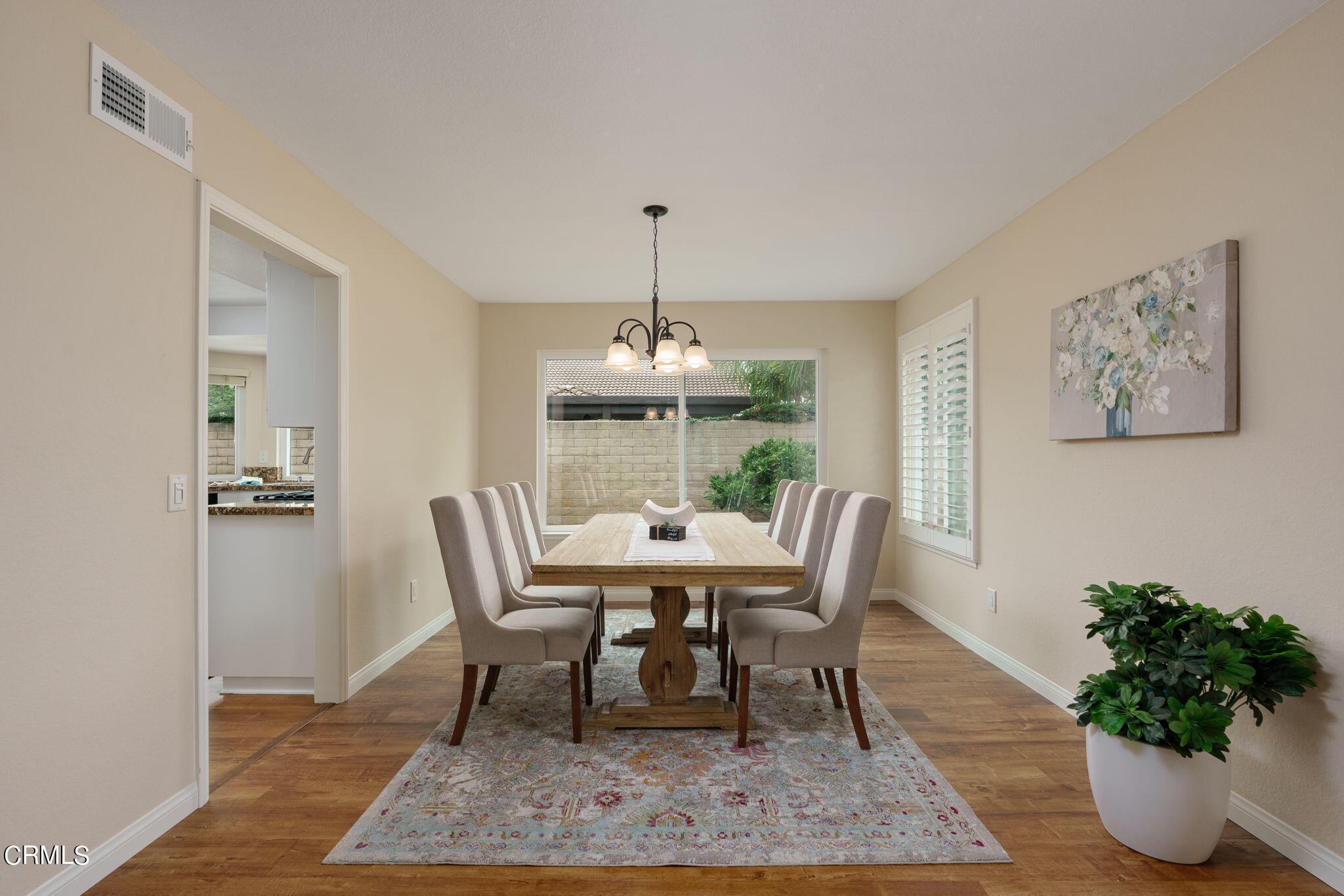 2281 Southern Hill Drive Oxnard, CA 93036 - Photo 7 of 29 a dining room with furniture window and wooden floor