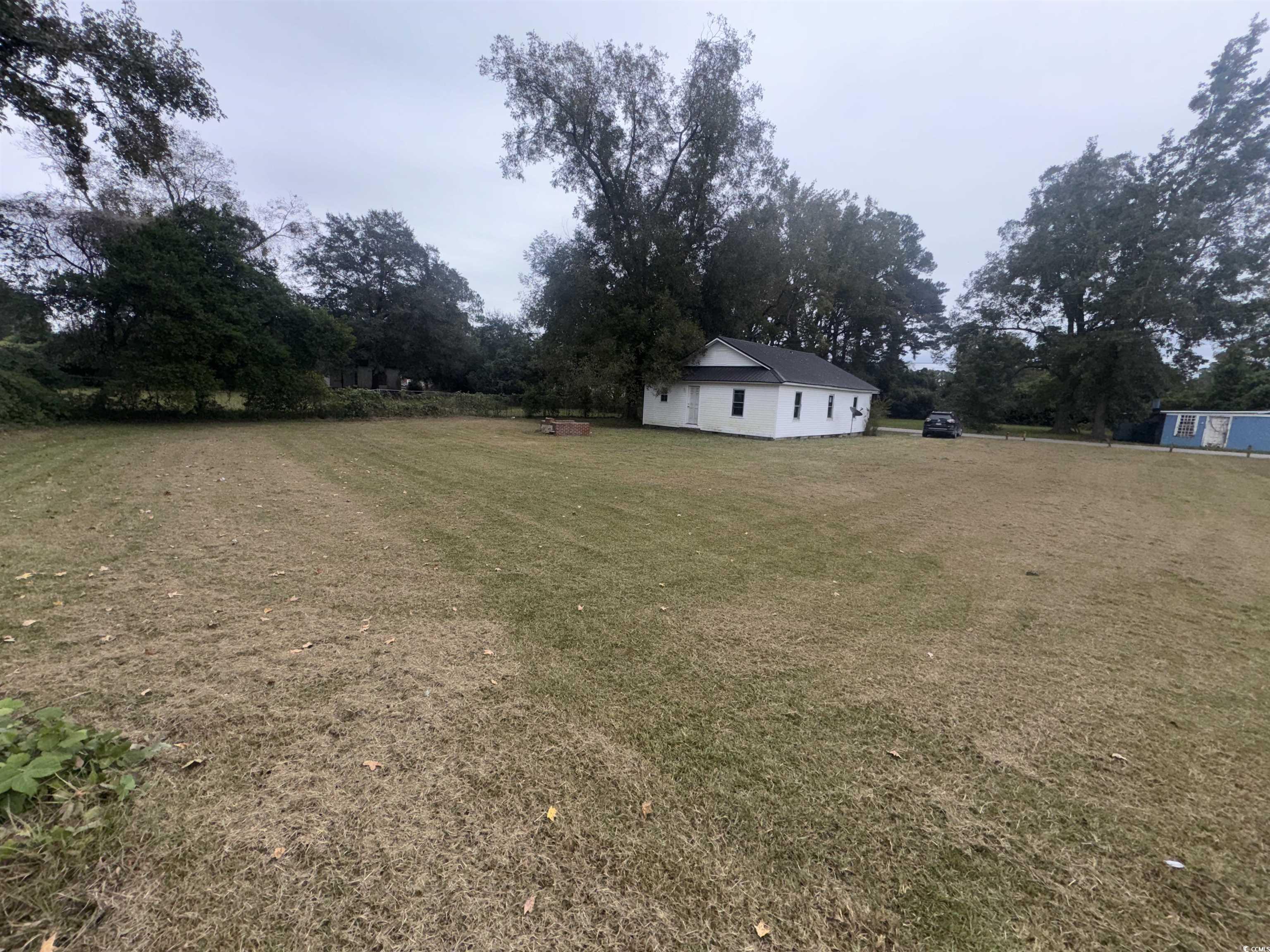 106 Raeford Street Mullins, SC 29574 - Photo 5 of 15 View of grassy yard