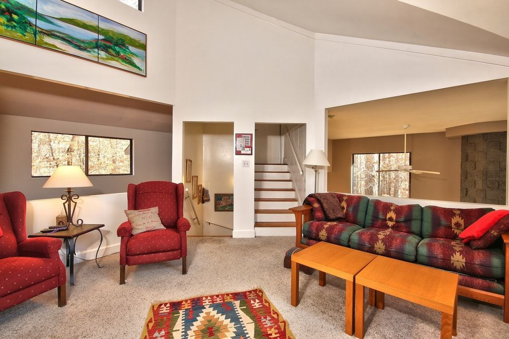 11312 Saddleview Court Raleigh, NC 27613 - Photo 13 of 25 Great space for a bonus room! Overlooks the dining room and includes carpet and bookshelves! Cozy up and read a great book up here or enjoy a good movie. Loft