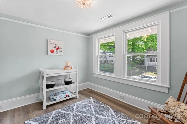 a room with furniture and a window