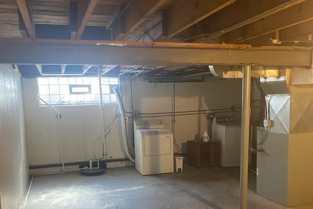 a bathroom with a sink and mirror