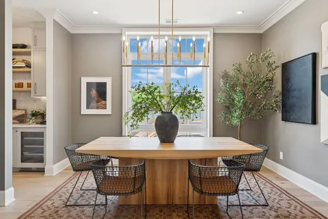 a kitchen with stainless steel appliances granite countertop a sink dishwasher stove and cabinets