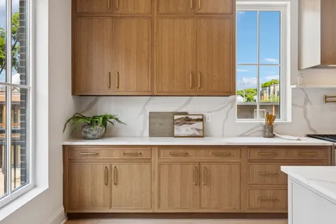 a view of dining room kitchen with furniture and wooden floor