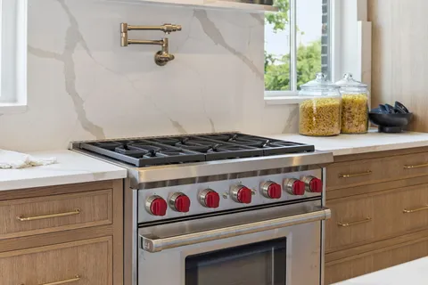 a spacious bedroom with a bed and a couch