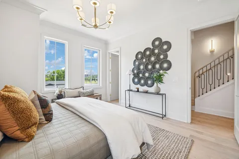 a en suite bathroom with double sink and a mirror