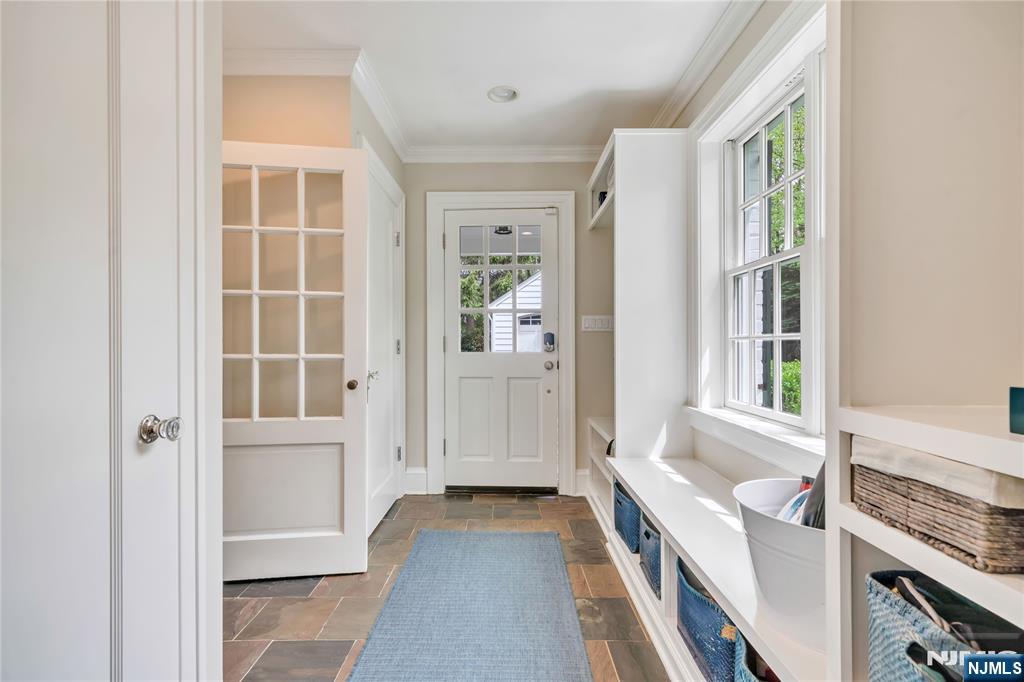 227 Fairmount Road Ridgewood, NJ 07450 - Photo 21 of 50 a view of a bathroom with a tub and windows