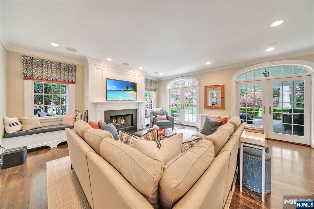 227 Fairmount Road Ridgewood, NJ 07450 - Photo 25 of 50 a living room with fireplace furniture and a large window