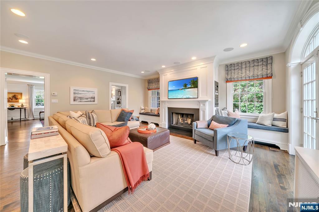 227 Fairmount Road Ridgewood, NJ 07450 - Photo 27 of 50 a living room with furniture and a fireplace