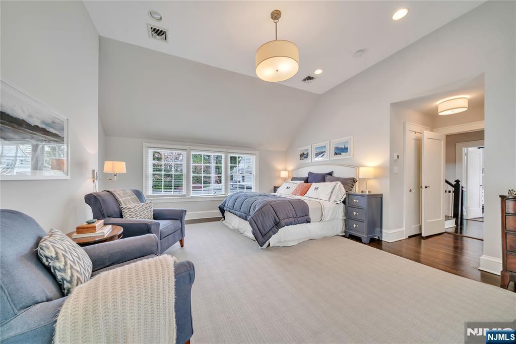 227 Fairmount Road Ridgewood, NJ 07450 - Photo 29 of 50 a bedroom with furniture and a large window