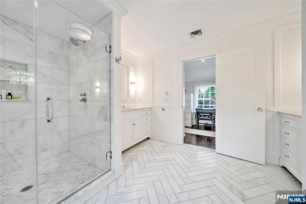 227 Fairmount Road Ridgewood, NJ 07450 - Photo 33 of 50 a bathroom with a shower and a sink
