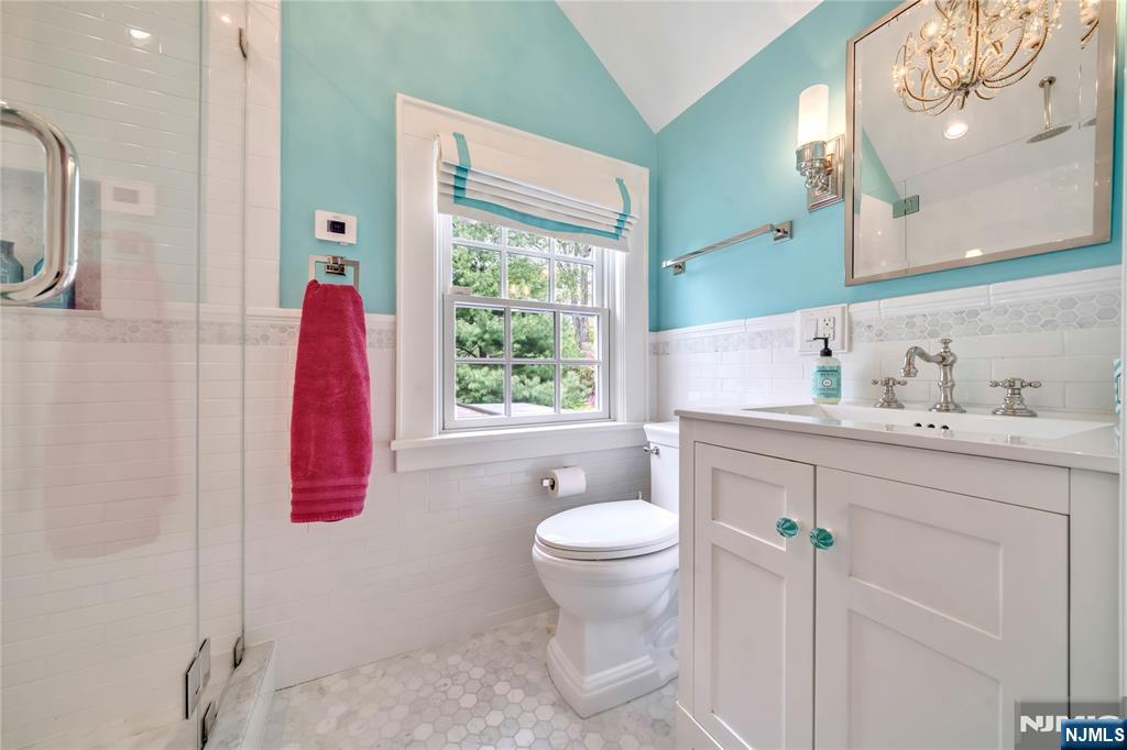 227 Fairmount Road Ridgewood, NJ 07450 - Photo 36 of 50 a bathroom with a sink toilet and shower