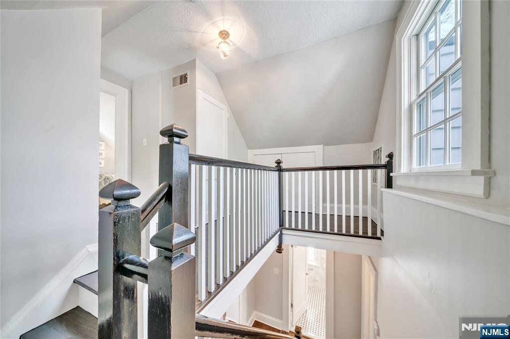 227 Fairmount Road Ridgewood, NJ 07450 - Photo 40 of 50 a view of staircase with railing and white walls