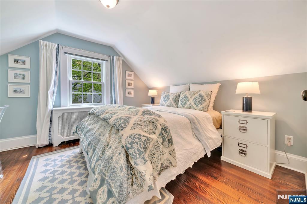 227 Fairmount Road Ridgewood, NJ 07450 - Photo 41 of 50 a bedroom with a bed and a large window