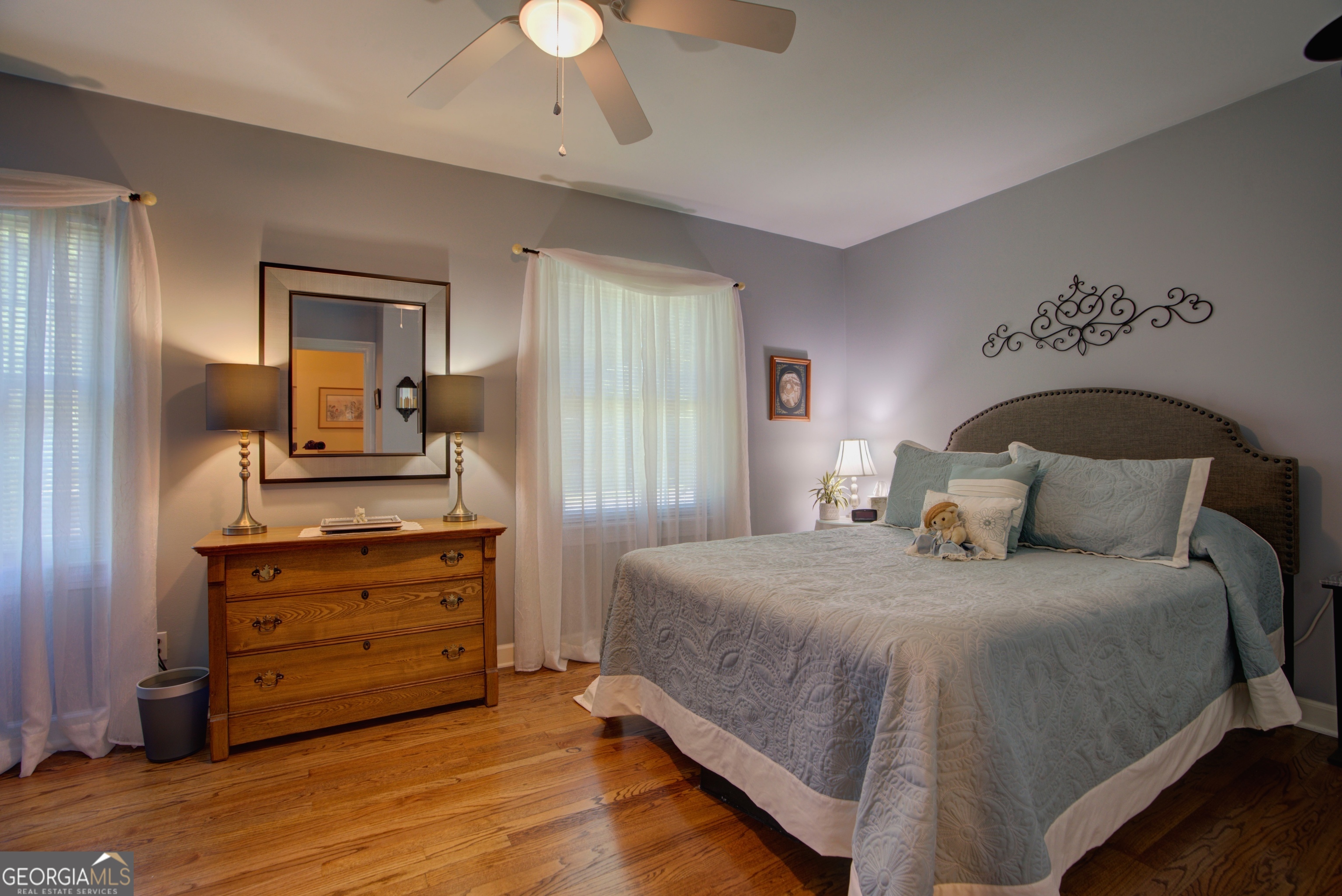 204 Green View Road Southwest Rome, GA 30165 - Photo 37 of 62 a bedroom with a bed and wooden floor