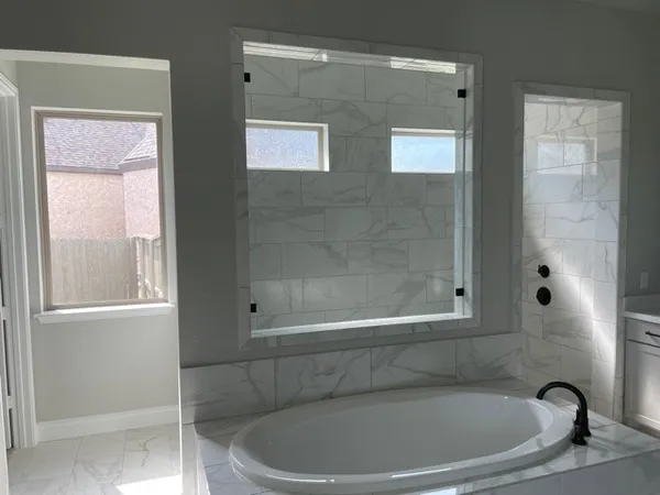 a bathroom with a bathtub