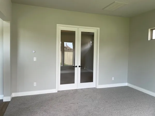 an empty room and closet area