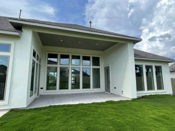 a view of front door and yard