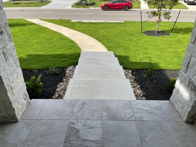 a view of a garden with an outdoor space