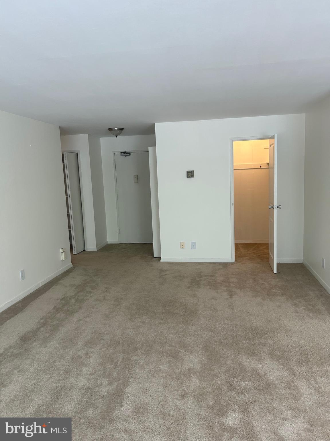 1900 Lyttonsville Road, Unit 214 Silver Spring, MD 20910 - Photo 10 of 21 an empty room with closet area