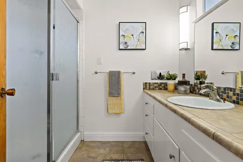 a bathroom with a sink and a mirror