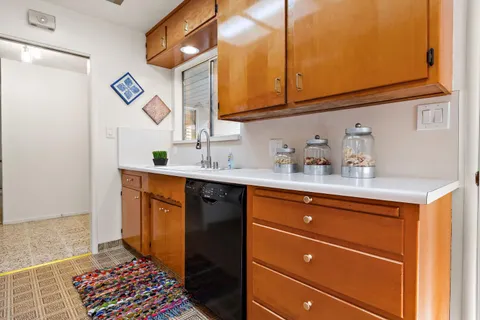 a room with a sink and a cabinets