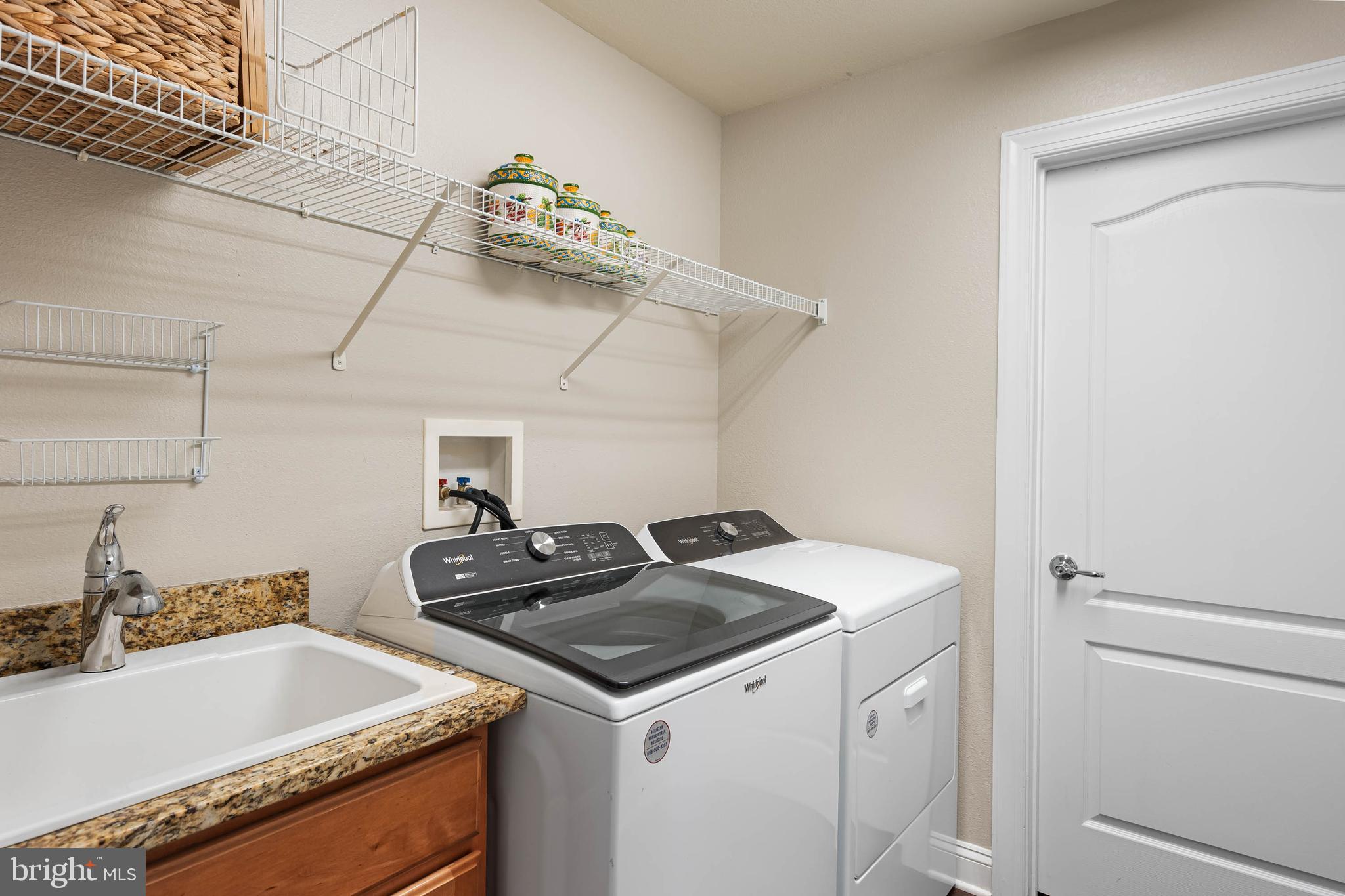 20718 Annondell Drive Lewes, DE 19958 - Photo 32 of 46 a utility room with dryer and washer