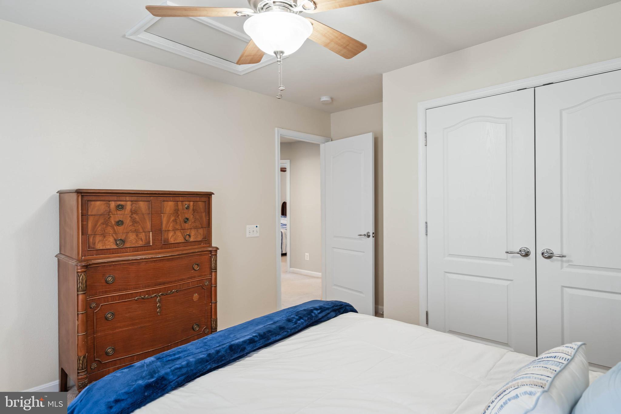 20718 Annondell Drive Lewes, DE 19958 - Photo 39 of 46 a bedroom with a bed and a dresser