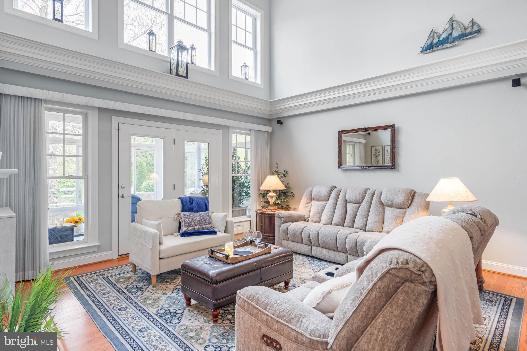 20718 Annondell Drive Lewes, DE 19958 - Photo 4 of 46 a living room with furniture a rug and a large window