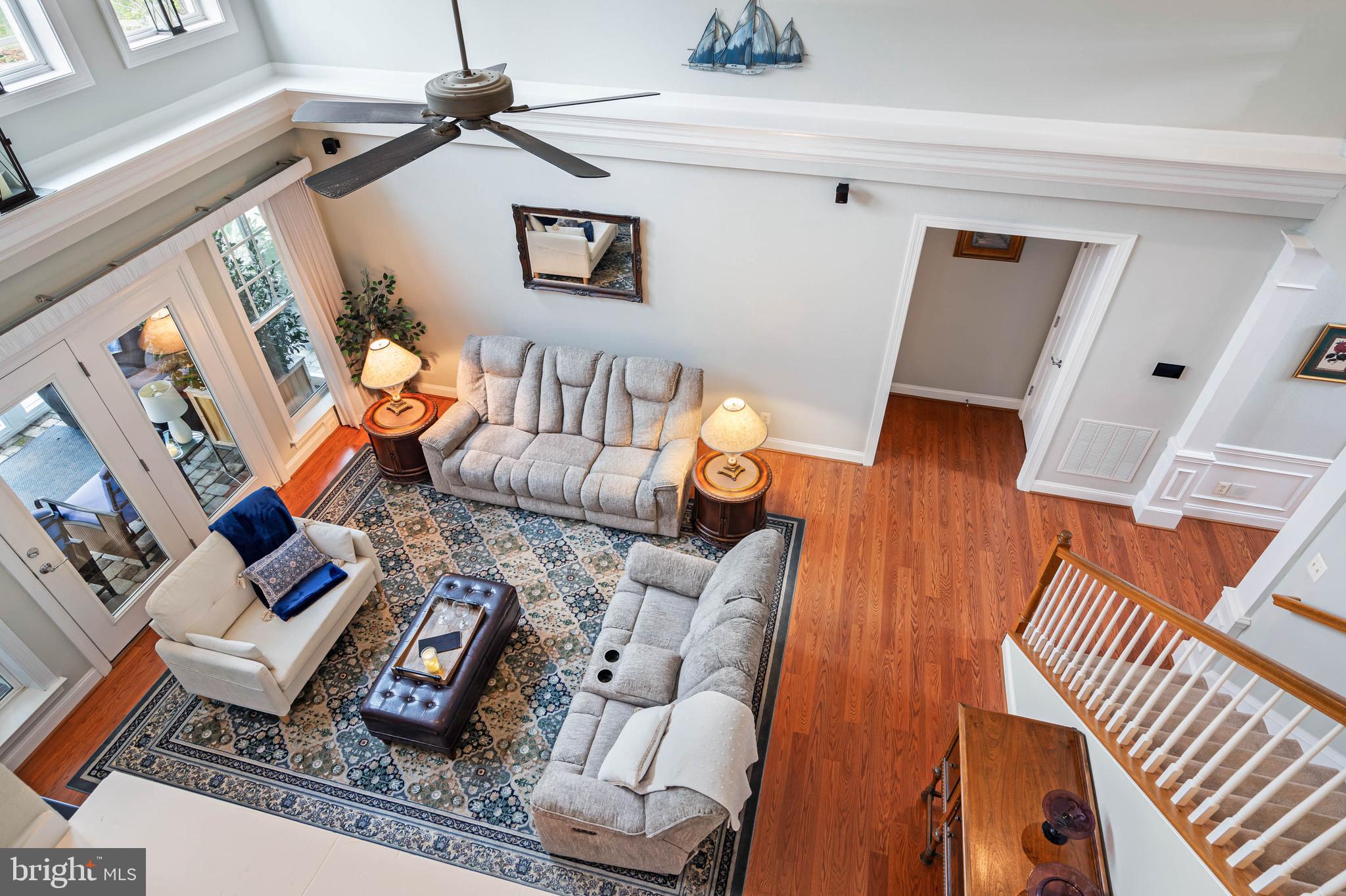 20718 Annondell Drive Lewes, DE 19958 - Photo 42 of 46 a living room with furniture and wooden floor