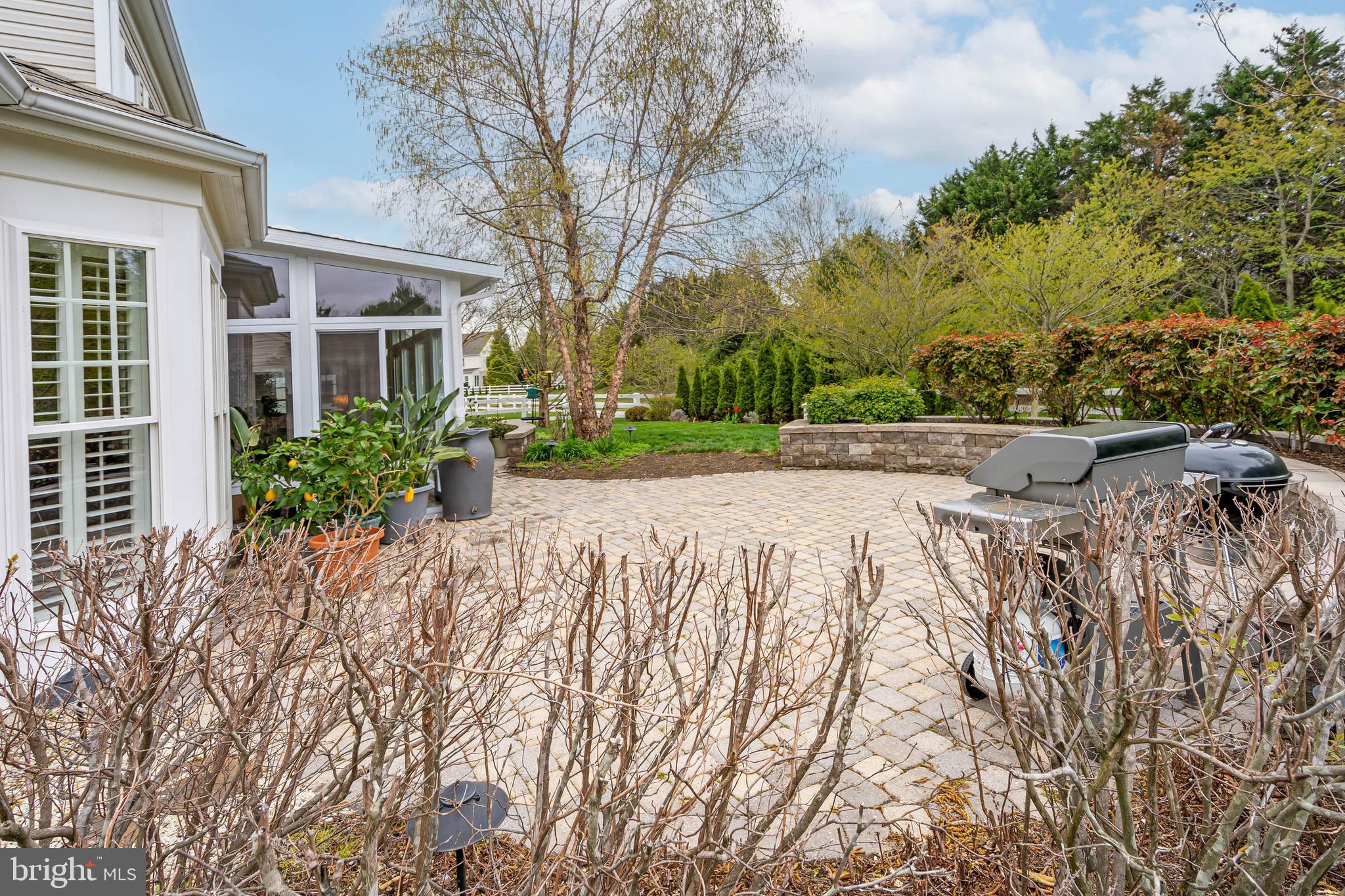 20718 Annondell Drive Lewes, DE 19958 - Photo 46 of 46 front view of a house with a yard and potted plants