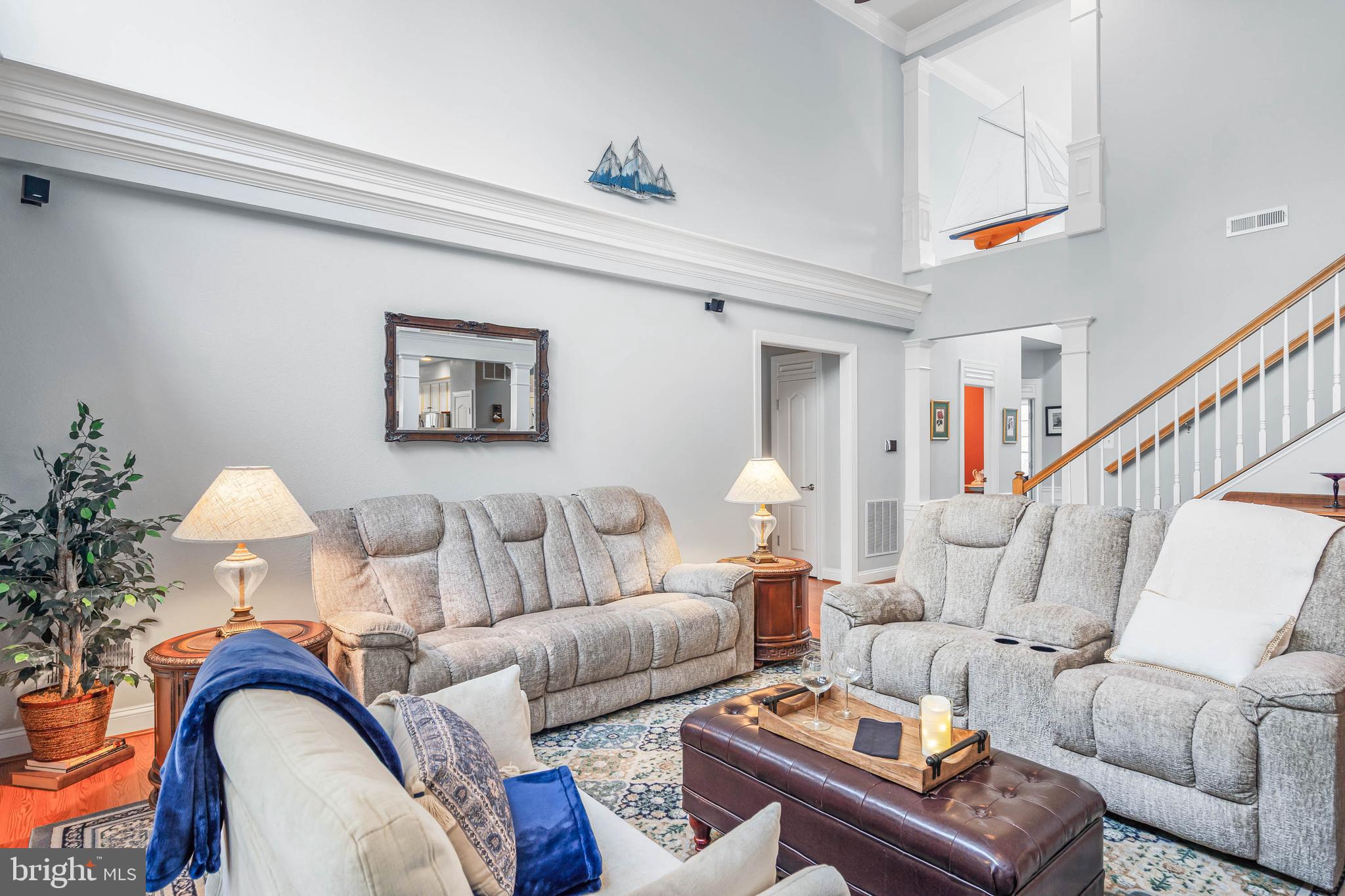 20718 Annondell Drive Lewes, DE 19958 - Photo 5 of 46 a living room with furniture and a potted plant