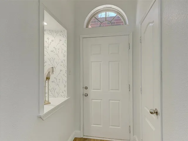 a living room with furniture fireplace and flat screen tv