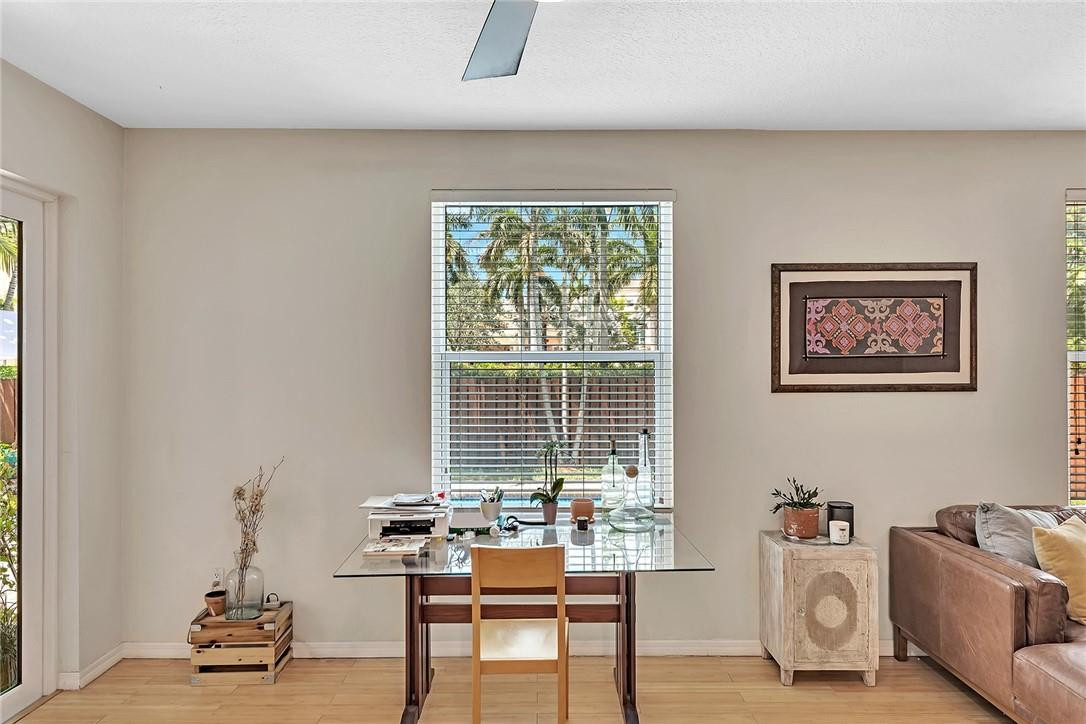 15971 Southwest 96th Terrace Miami, FL 33196 - Photo 31 of 79 a room with furniture and window