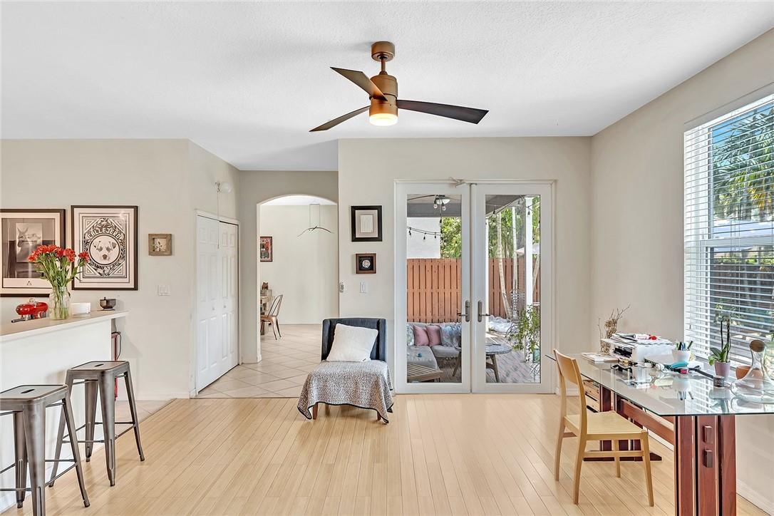 15971 Southwest 96th Terrace Miami, FL 33196 - Photo 36 of 79 a living room with furniture and wooden floor