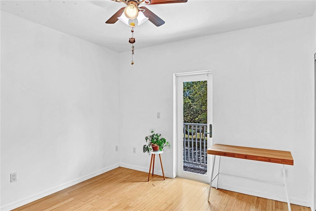 15971 Southwest 96th Terrace Miami, FL 33196 - Photo 63 of 79 a view of an empty room with a window
