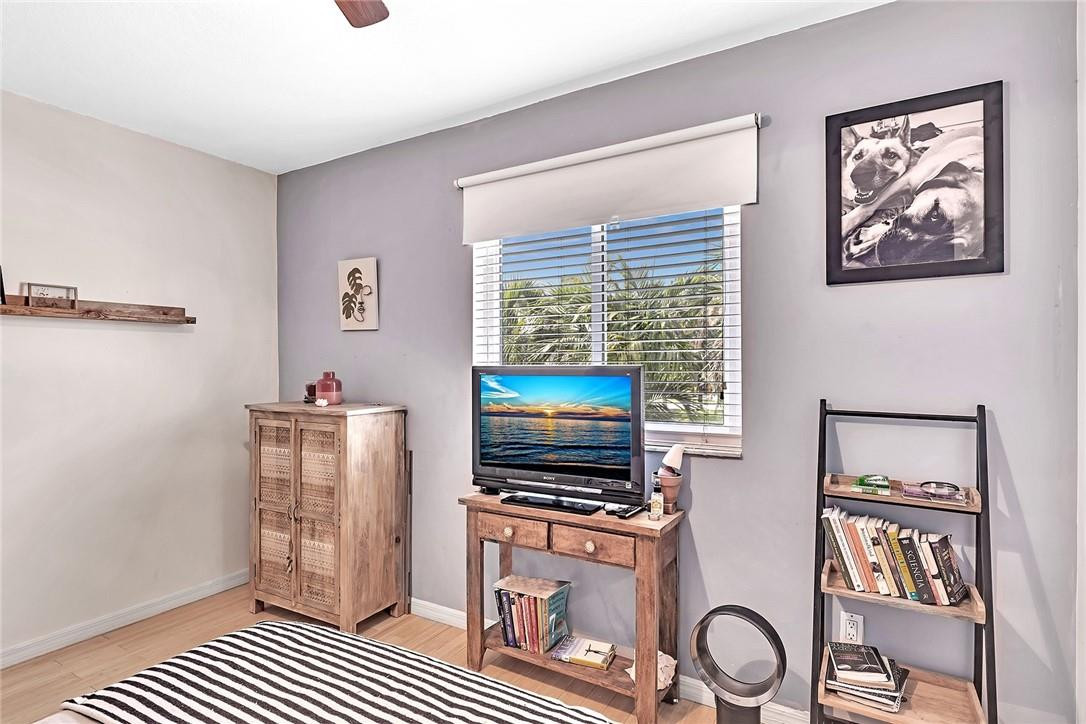 15971 Southwest 96th Terrace Miami, FL 33196 - Photo 71 of 79 a living room with furniture and a flat screen tv