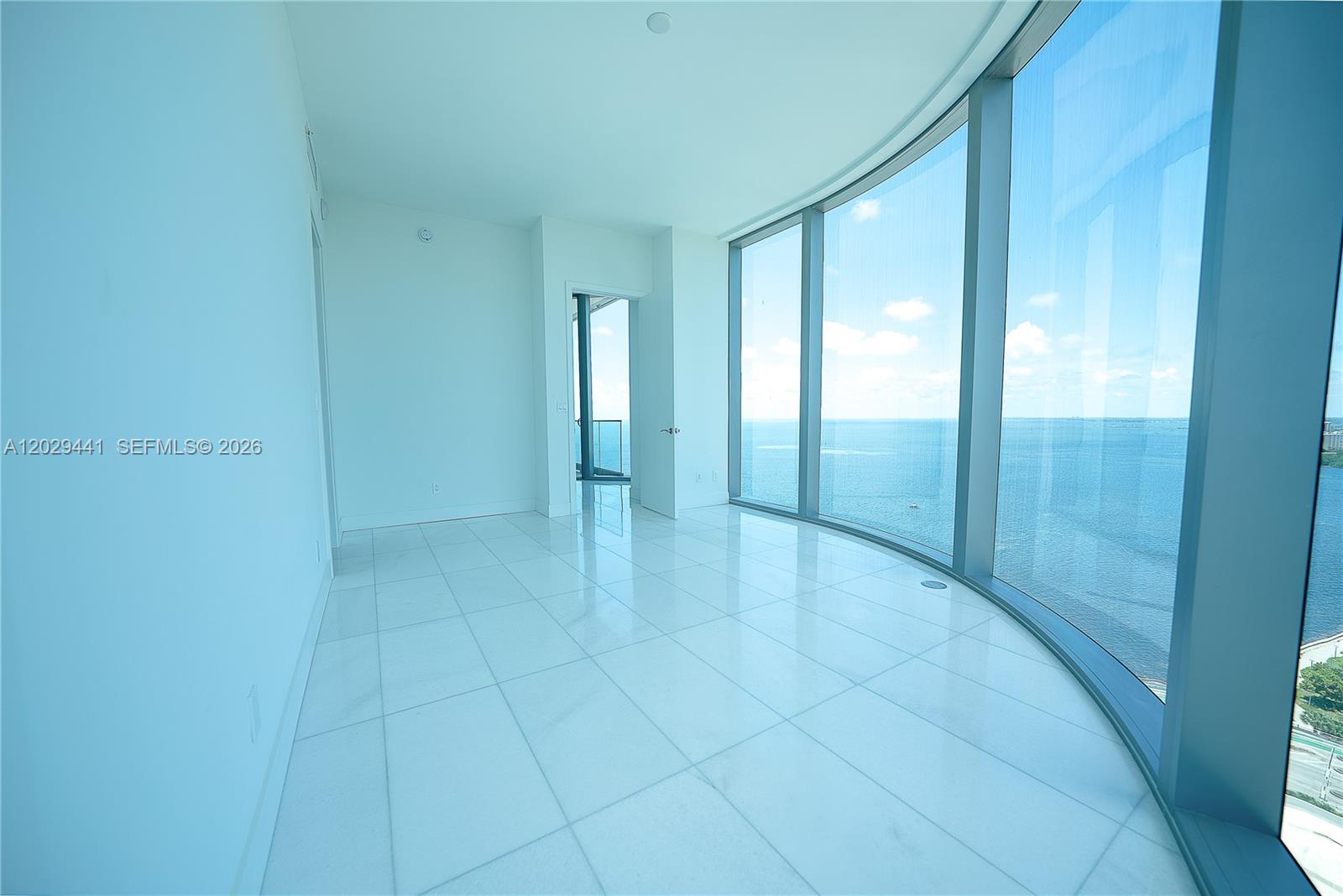 175 Southeast 25th Road, Unit 2103 Miami, FL 33129 - Photo 16 of 27 a view of an empty room with glass door