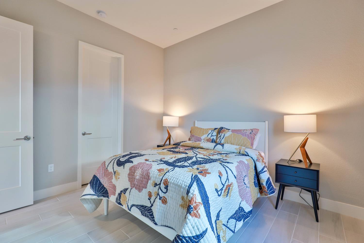 4610 Clb Vista Way Penryn, CA 95663 - Photo 16 of 27 a bedroom with a bed and a lamp