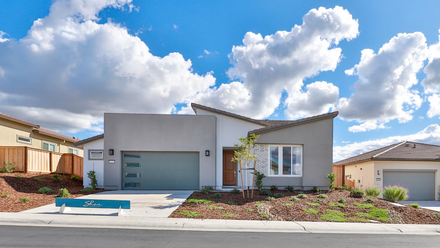4610 Clb Vista Way Penryn, CA 95663 - Photo 2 of 27 a front view of a house with a yard and garage