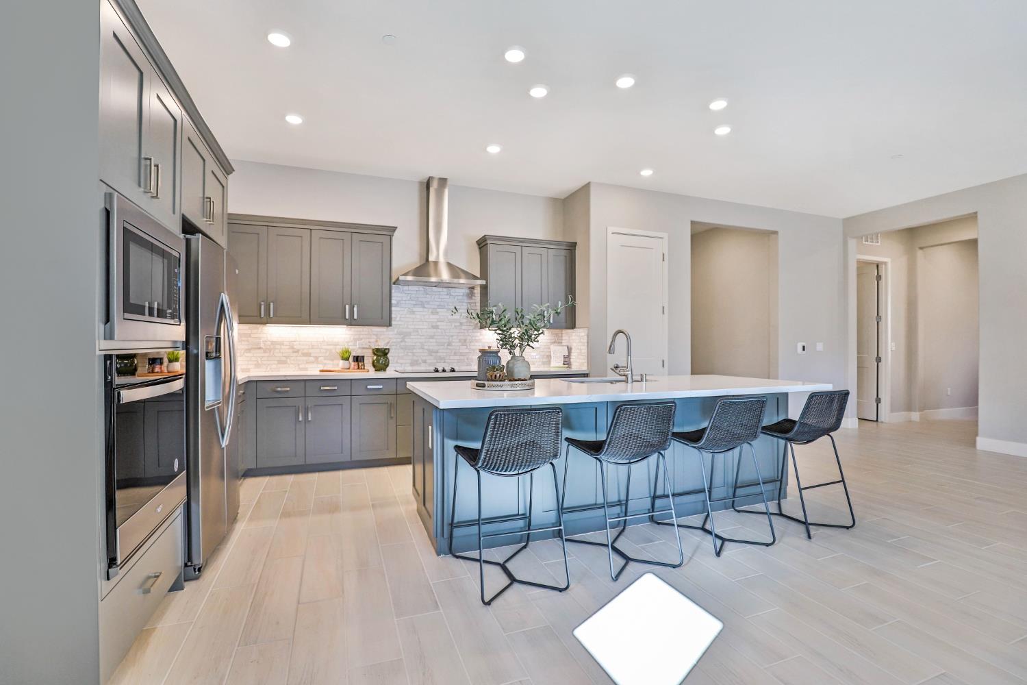 4610 Clb Vista Way Penryn, CA 95663 - Photo 4 of 27 a kitchen with a sink cabinets and refrigerator