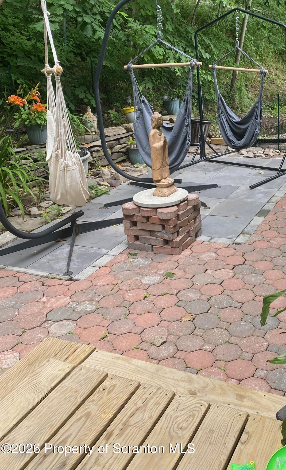 155 Baylor Road Nicholson, PA 18446 - Photo 20 of 53 a backyard of a house with barbeque and wooden fence