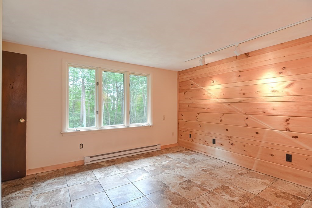 202 Boxboro Road Stow, MA 01775 - Photo 33 of 40 a view of an empty room with a window